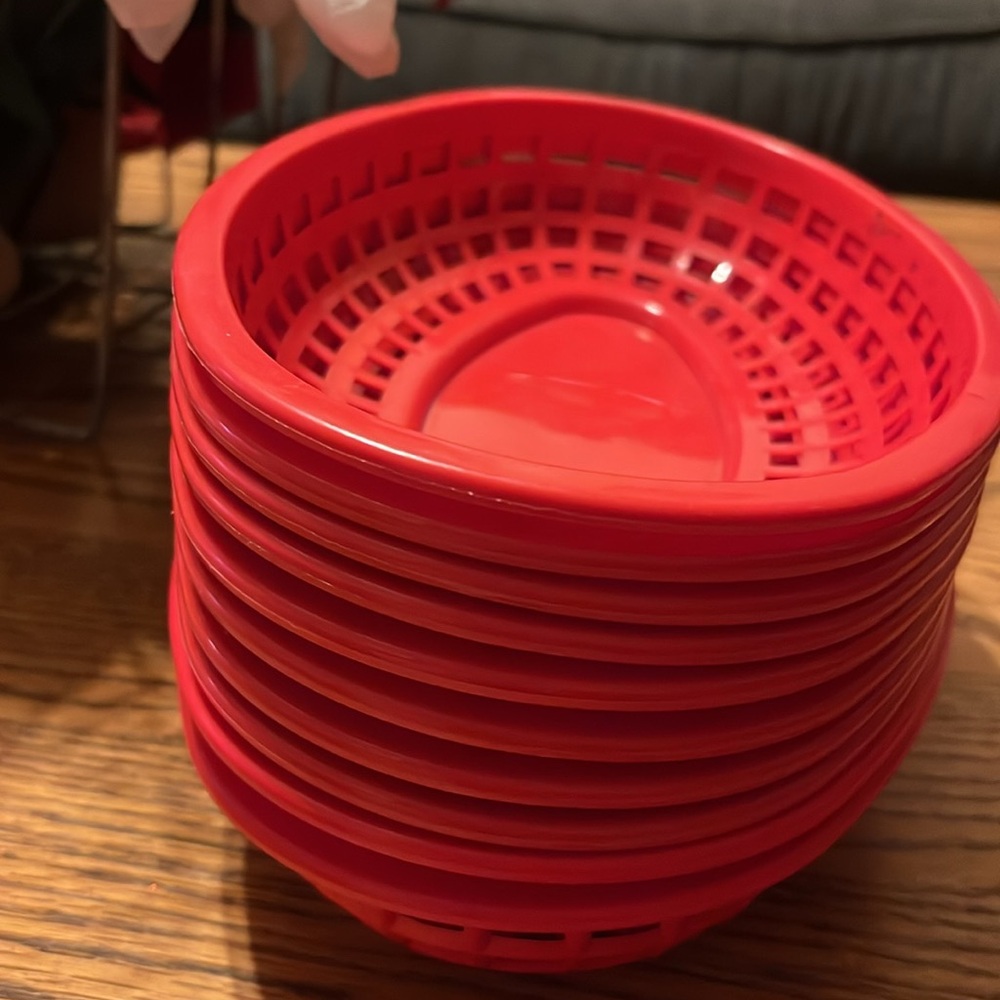 Tablecraft 1074R 9 1/4" x 6" x 1 3/4" red classic oval plastic basket  set of 10